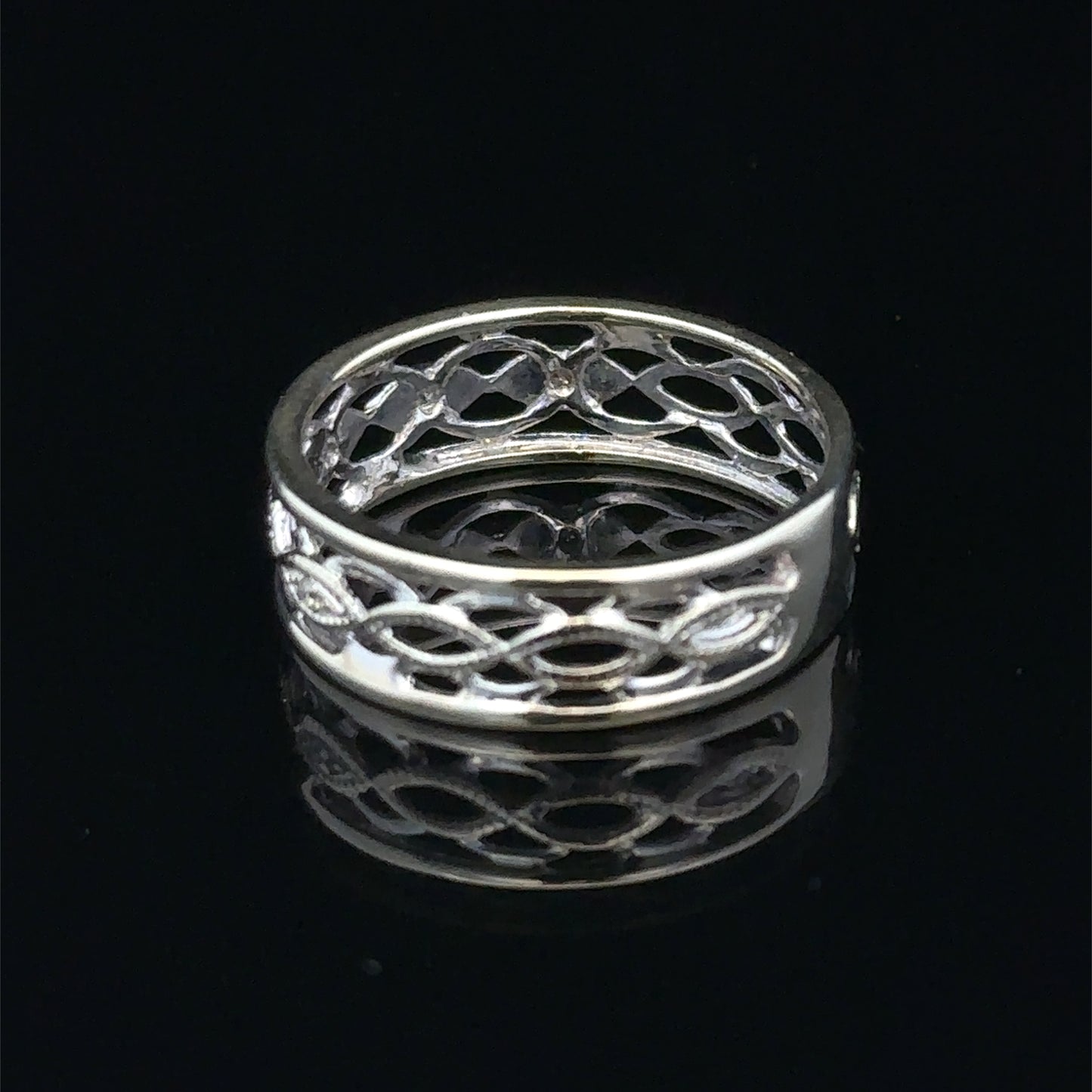 9ct white gold diamond ring in size L with sparkling diamonds, showcasing elegant craftsmanship by Reeves and Sons.