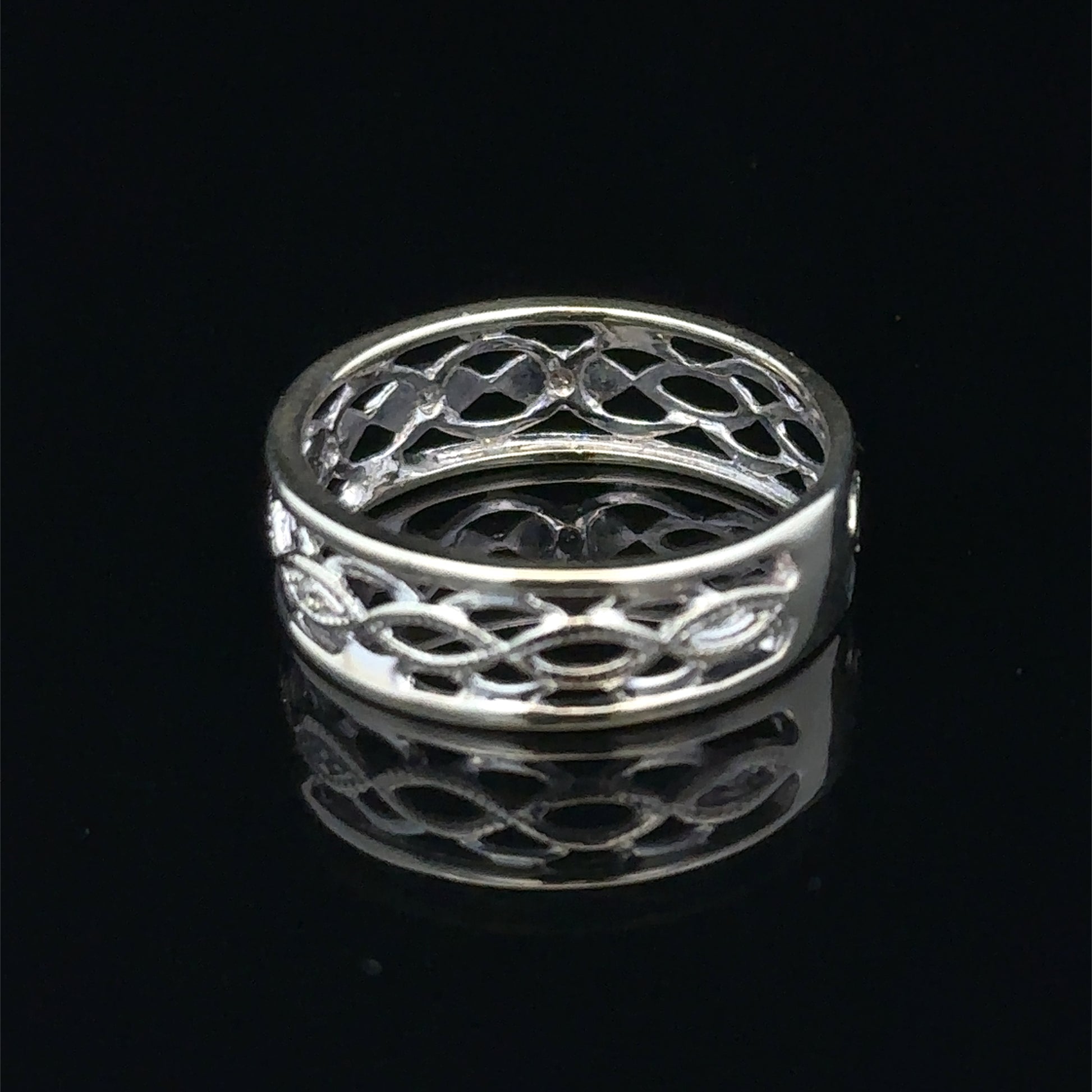 9ct white gold diamond ring in size L with sparkling diamonds, showcasing elegant craftsmanship by Reeves and Sons.