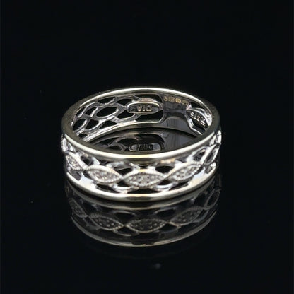 9ct white gold diamond ring in size L with sparkling diamonds, showcasing elegant craftsmanship by Reeves and Sons.