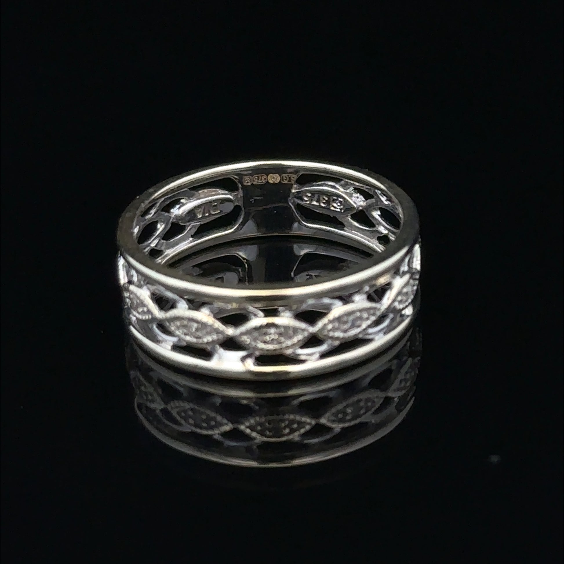 9ct white gold diamond ring in size L with sparkling diamonds, crafted by Reeves and Sons, displayed on a neutral background.