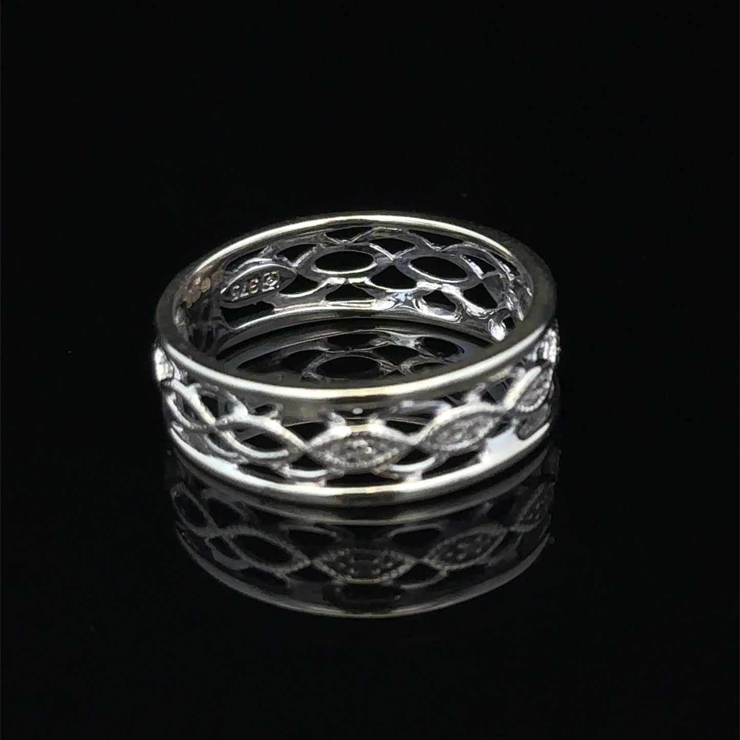 9ct white gold diamond ring in size L featuring sparkling diamonds, crafted by Reeves and Sons.