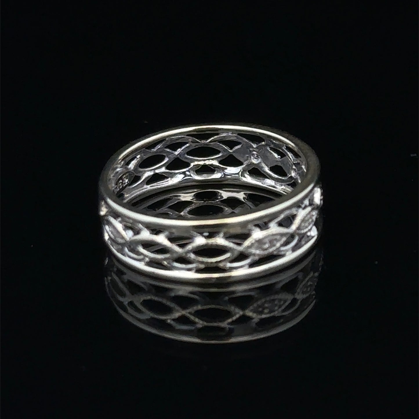 9ct white gold diamond ring in size L featuring sparkling diamonds, crafted by Reeves and Sons.