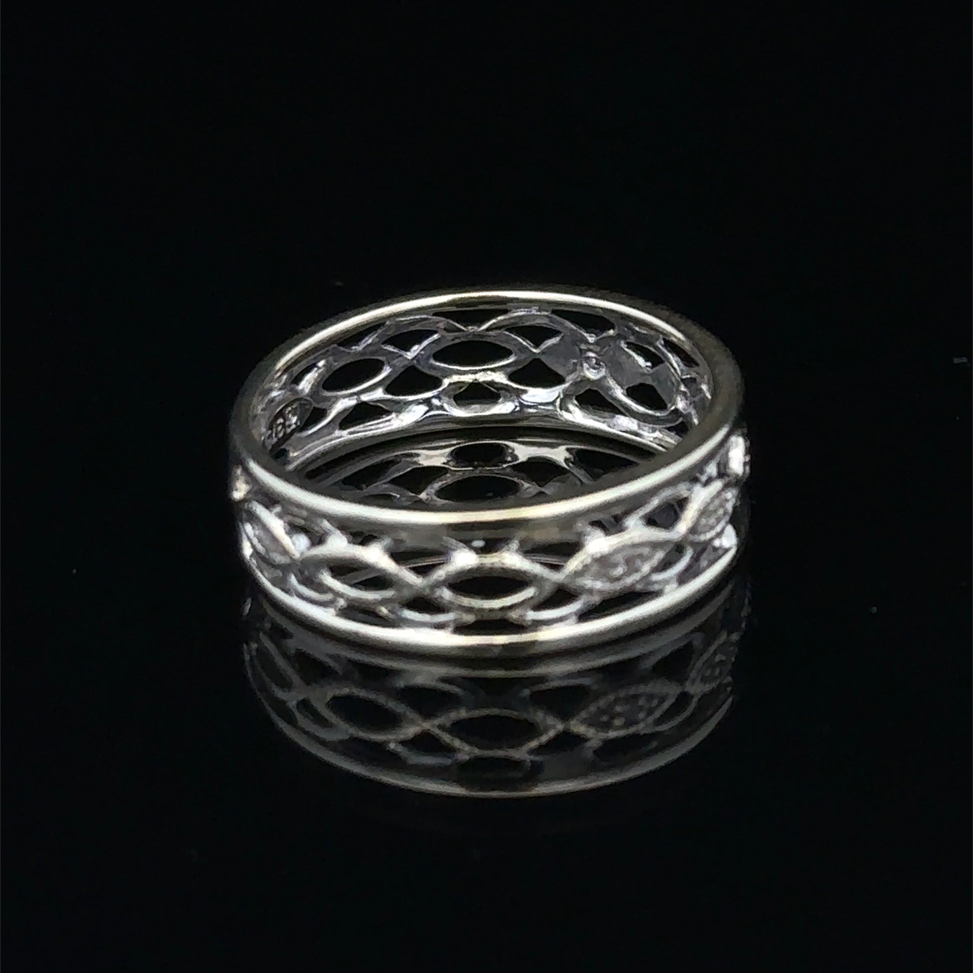 9ct white gold diamond ring in size L featuring sparkling diamonds, crafted by Reeves and Sons.