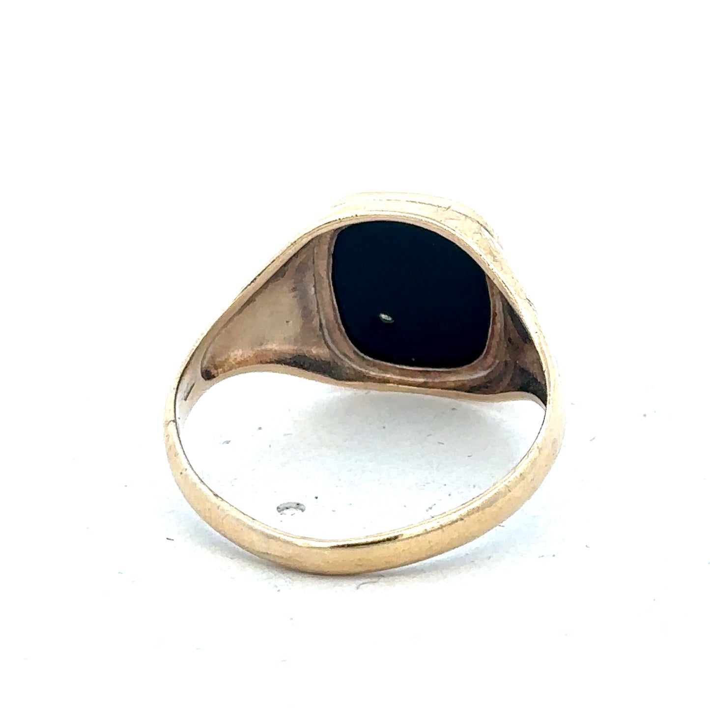 9ct yellow gold signet ring in size T with polished finish, featuring a smooth, oval face and classic band design.