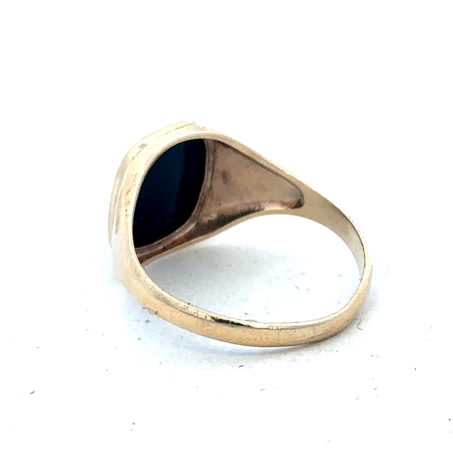 9ct yellow gold signet ring in size T with smooth polished finish, featuring a classic design by Reeves and Sons