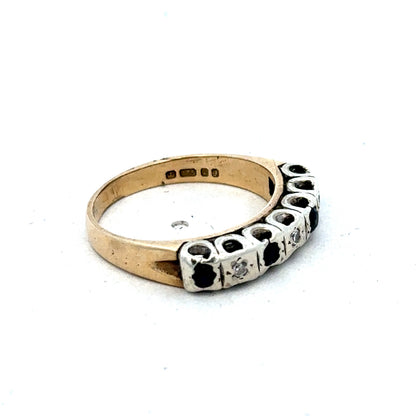 9ct yellow gold sapphire and diamond ring, size K, featuring a central sapphire gemstone surrounded by sparkling diamonds.