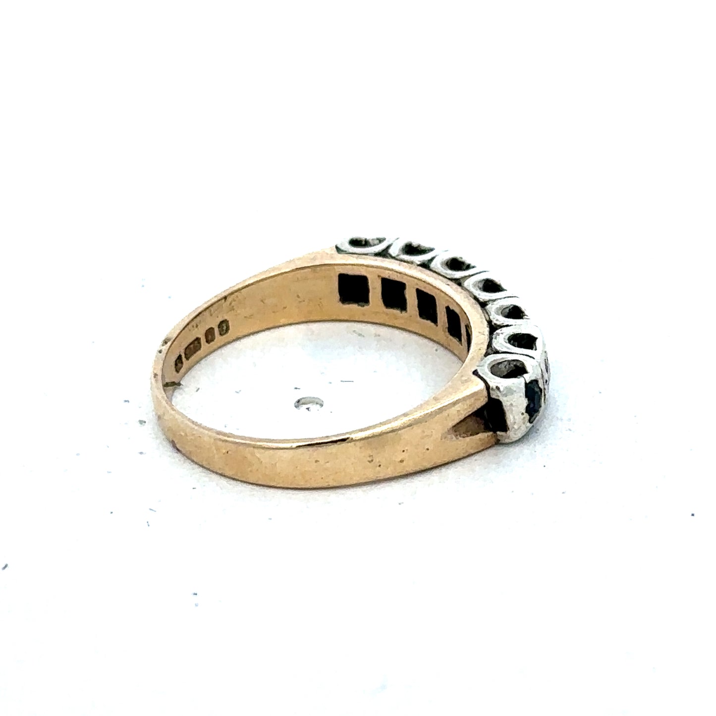 9ct yellow gold sapphire and diamond ring with intricate design, size K, from Reeves and Sons.