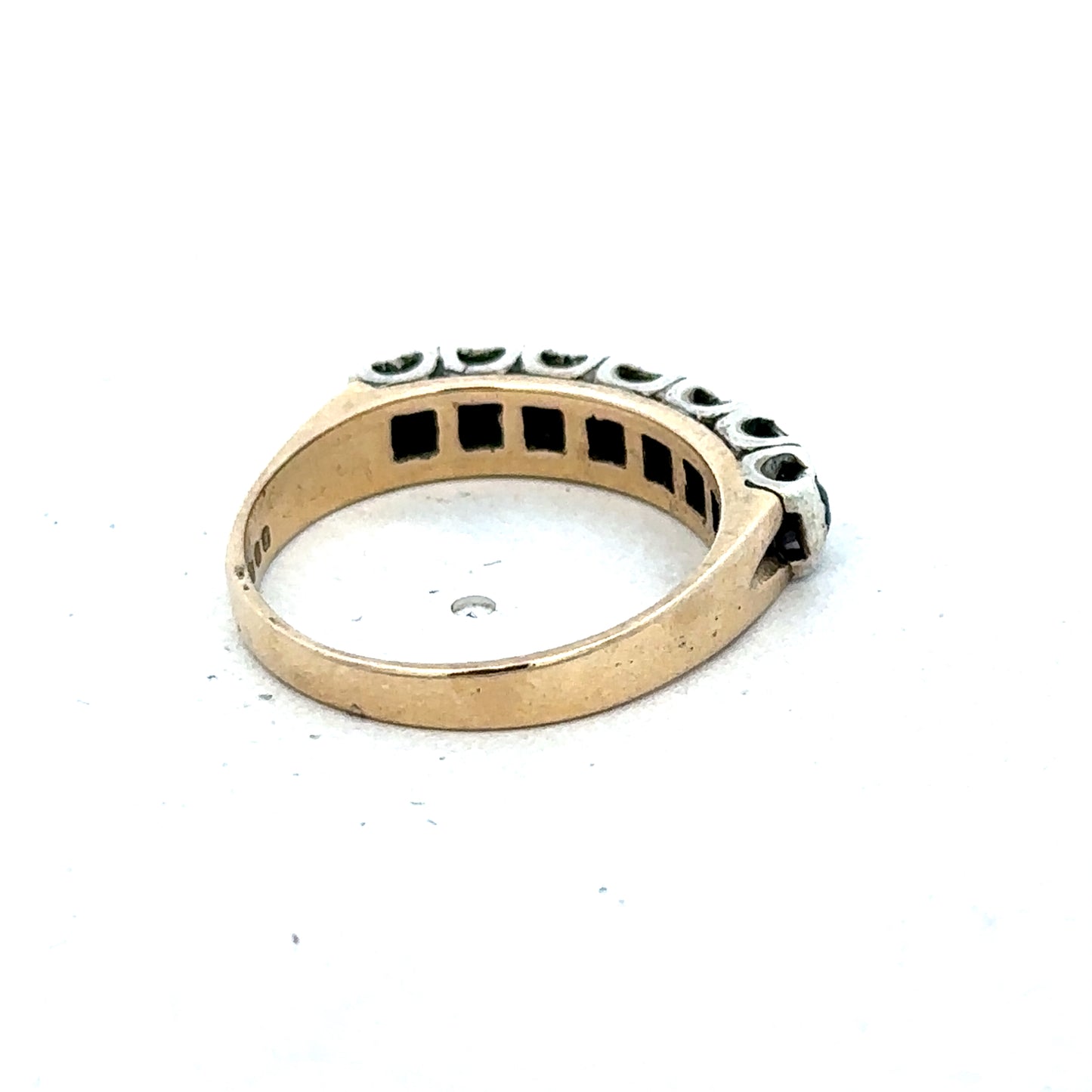 9ct yellow gold sapphire and diamond ring with size K, featuring a central sapphire gemstone and diamond accents by Reeves and Sons