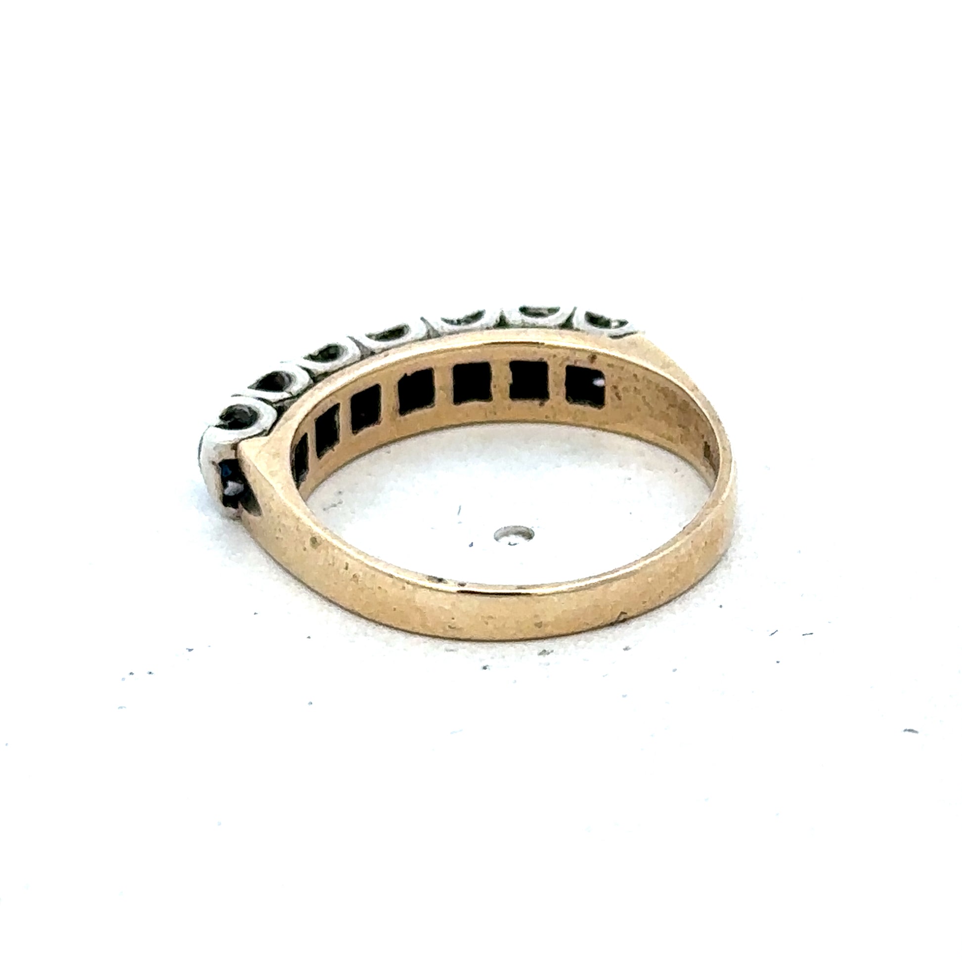 9ct yellow gold sapphire and diamond ring with size K, featuring a central sapphire and diamond accents, by Reeves and Sons.