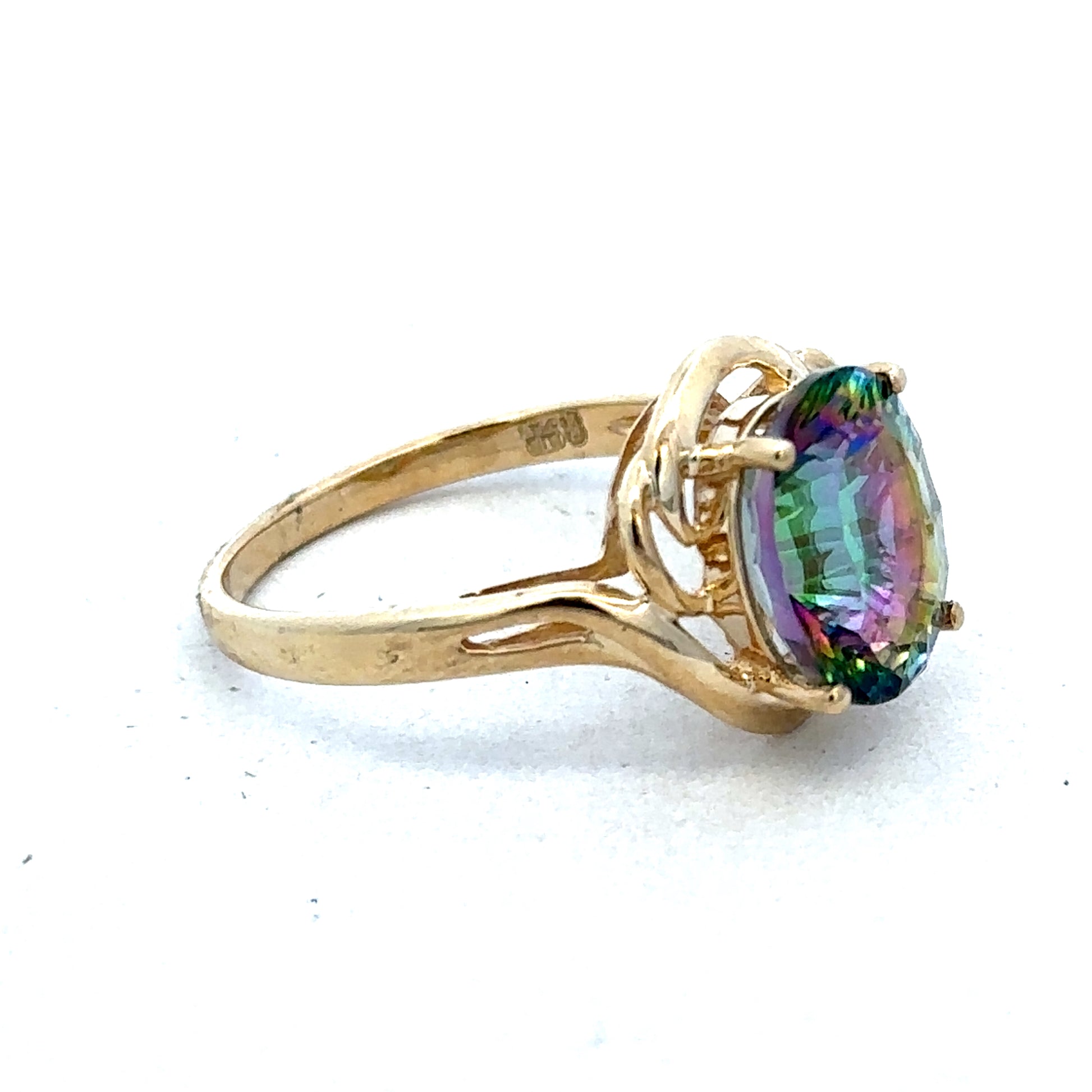 9ct yellow gold ring size P by Reeves and Sons, close-up showing smooth polished band and classic design.