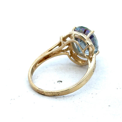 9ct yellow gold ring in size P with a simple band design, crafted by Reeves and Sons.
