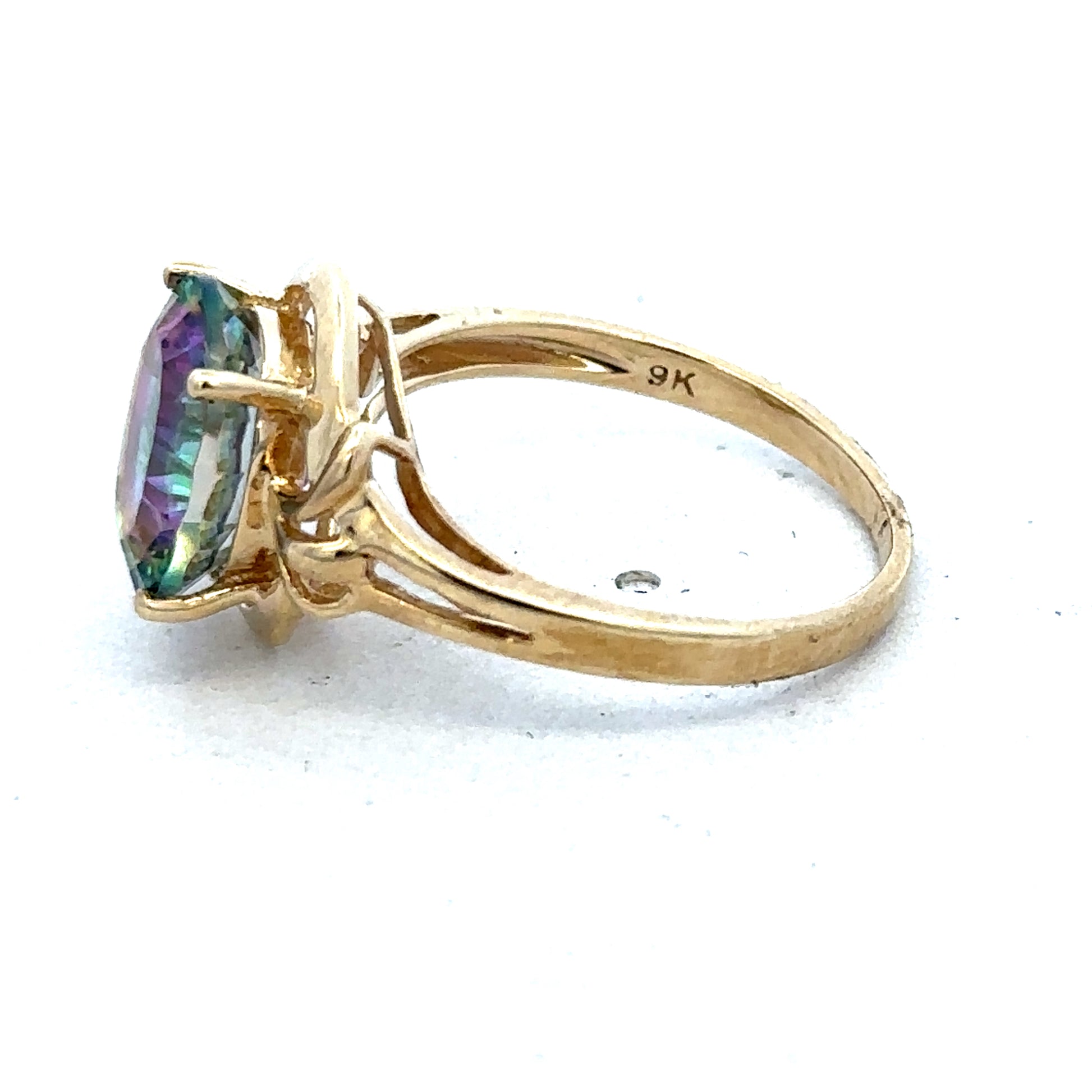9ct yellow gold ring size P from Reeves and Sons with a smooth polished band and classic design.