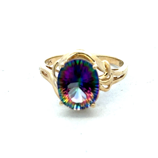 9ct yellow gold ring size P from Reeves and Sons, showcasing a smooth polished band with a subtle shine.