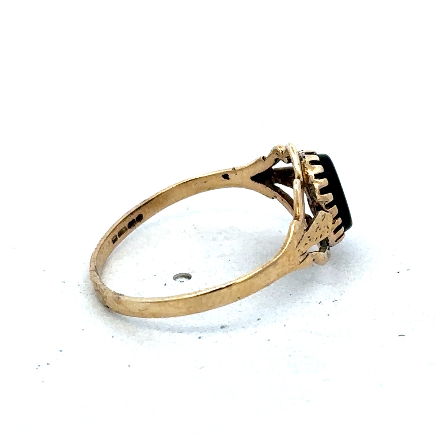9ct yellow gold ring size P1/2 with a smooth band, crafted by Reeves and Sons, shown on a neutral background.