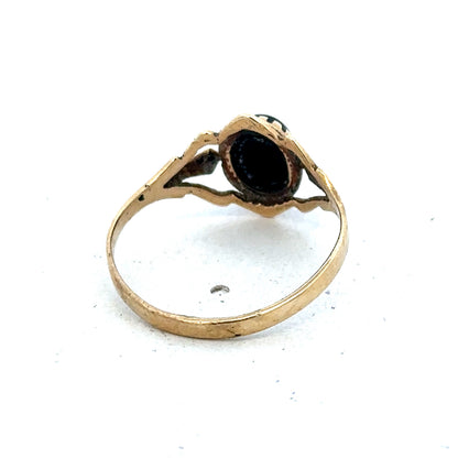9ct yellow gold ring size P1/2 by Reeves and Sons, featuring a polished band with subtle design details.