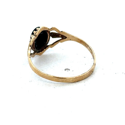 9ct yellow gold ring size P1/2 with a smooth band, crafted by Reeves and Sons, shown on a white background.