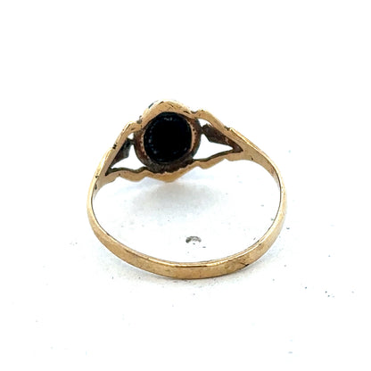 9ct yellow gold ring in size P1/2 with a smooth band, crafted by Reeves and Sons, shown in close-up detail.