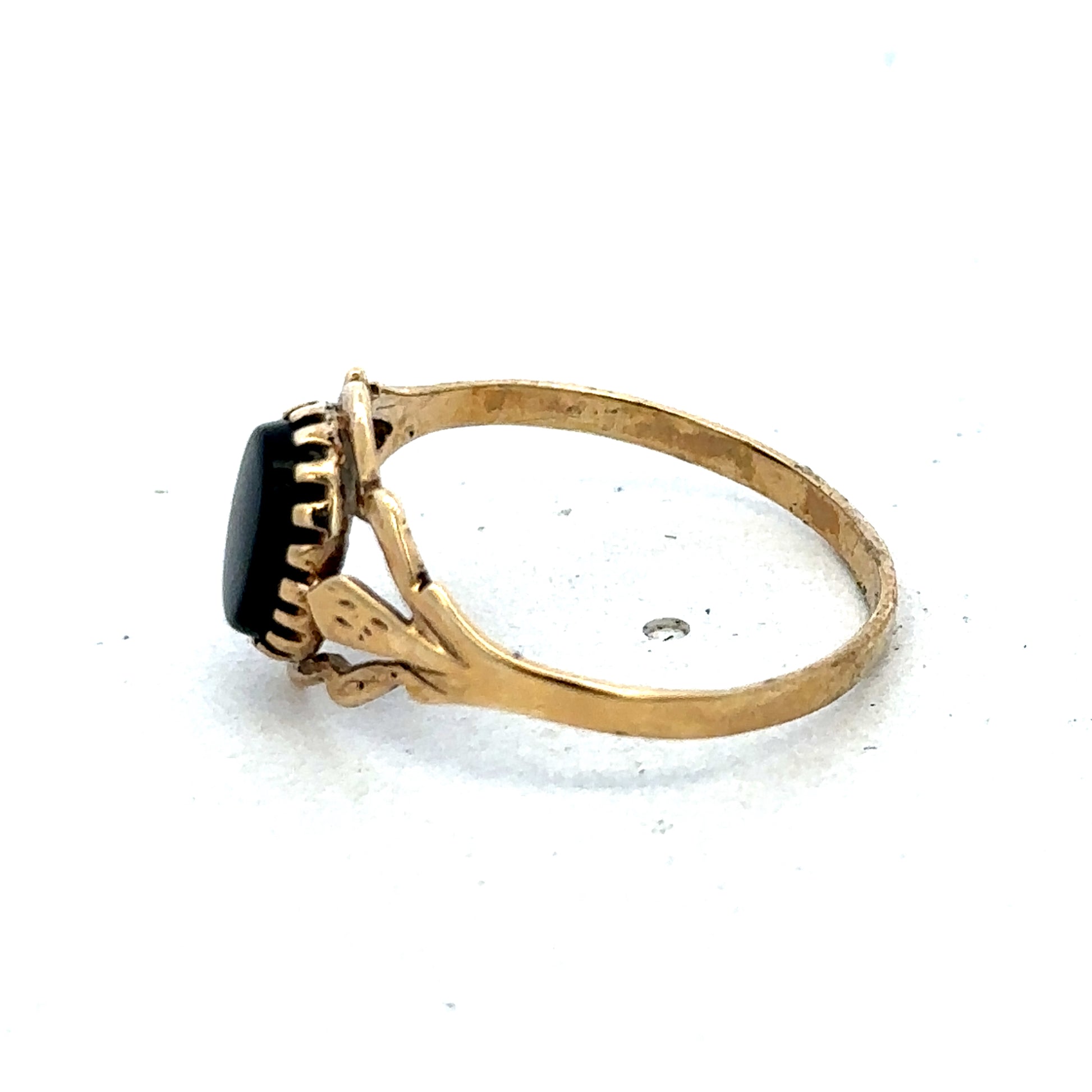 9ct yellow gold ring in size P1/2 with a smooth band, crafted by Reeves and Sons.