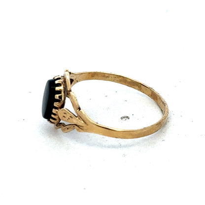 9ct yellow gold ring in size P1/2 with a smooth band, crafted by Reeves and Sons.
