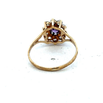 9ct yellow gold ring size M1/2 from Reeves and Sons, featuring a smooth polished band and classic design.