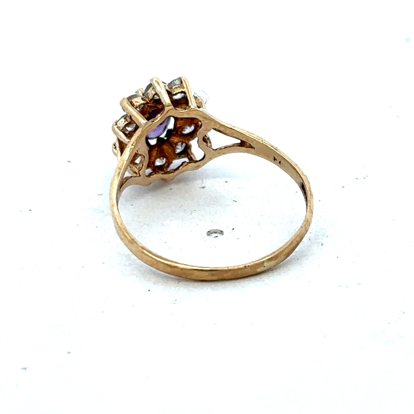 9ct yellow gold ring in size M1/2 with a polished finish, featuring a simple band design from Reeves and Sons.