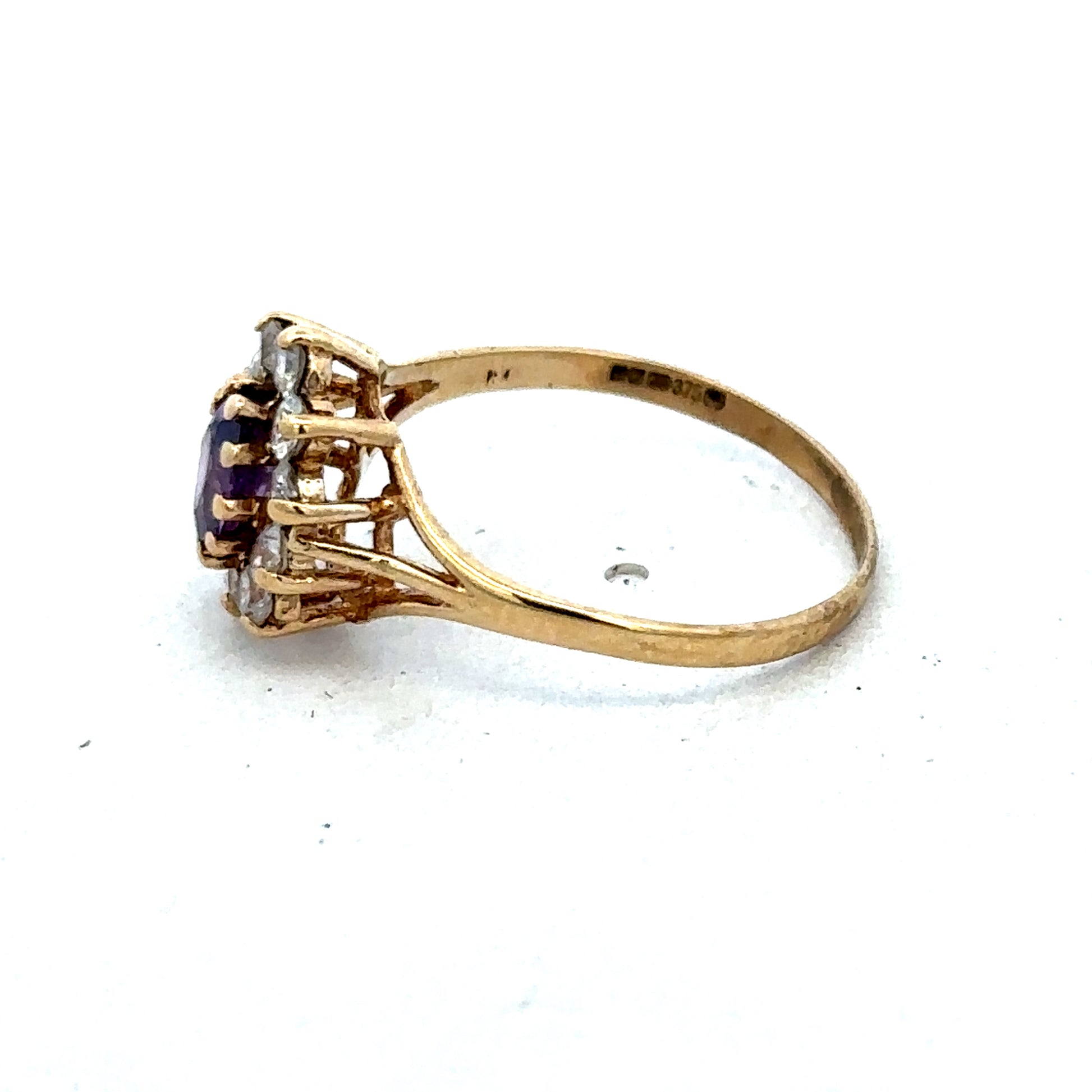 9ct yellow gold ring in size M1/2 with a smooth band, designed by Reeves and Sons, shown in a close-up image.