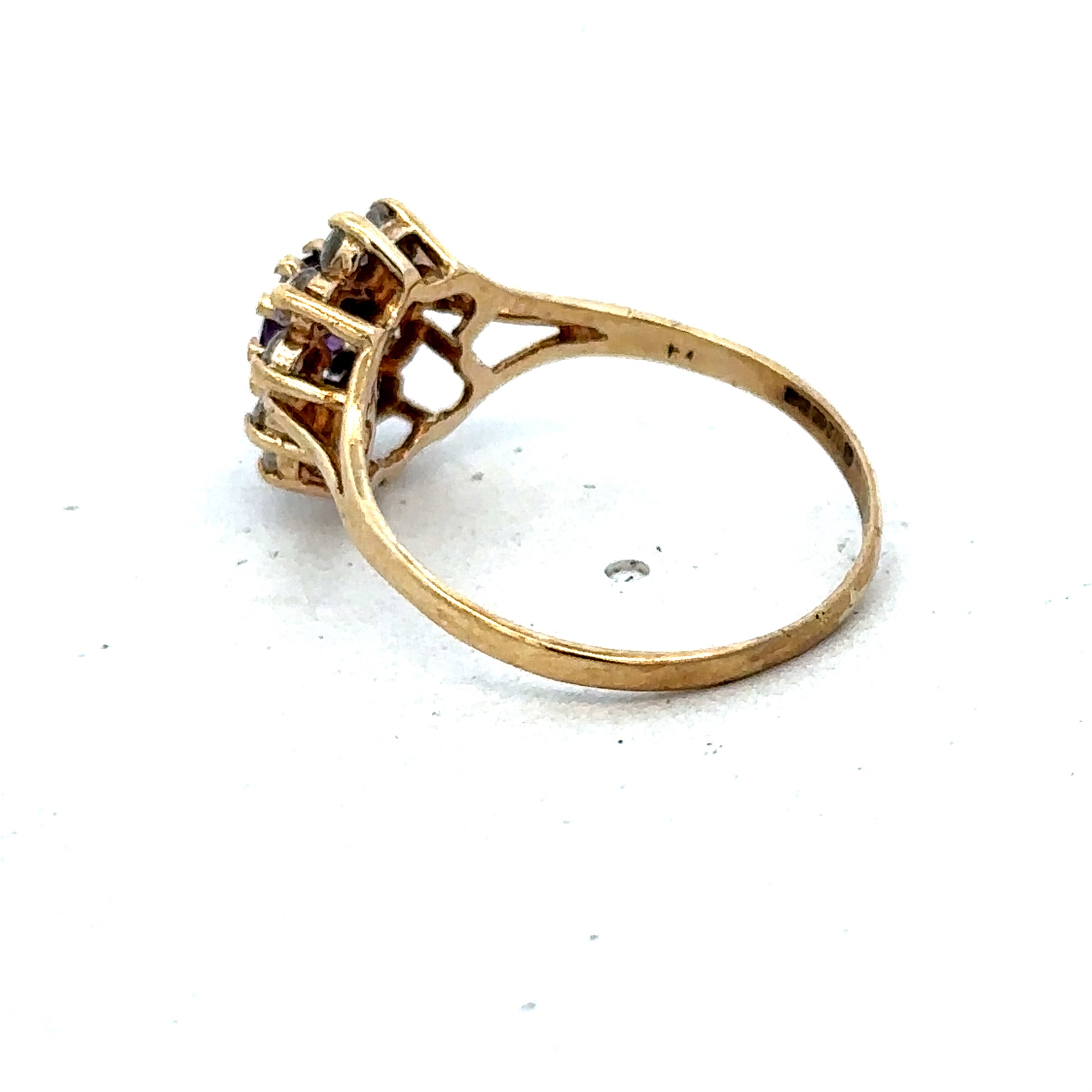 9ct yellow gold ring size M1/2 by Reeves and Sons, detailed close-up showing polished band and elegant design.