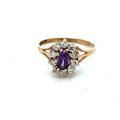 9ct yellow gold ring size M1/2 from Reeves and Sons, featuring a polished band and elegant design.