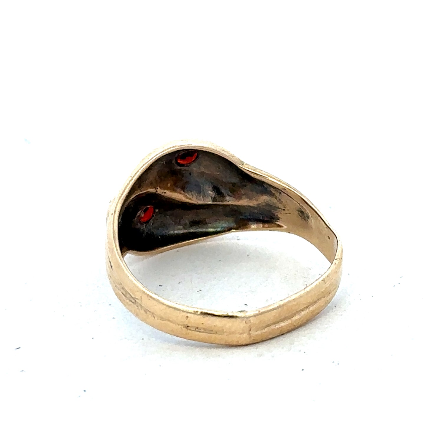 Yellow gold ring in size R by Reeves and Sons, showcasing a smooth, polished band with a classic design.