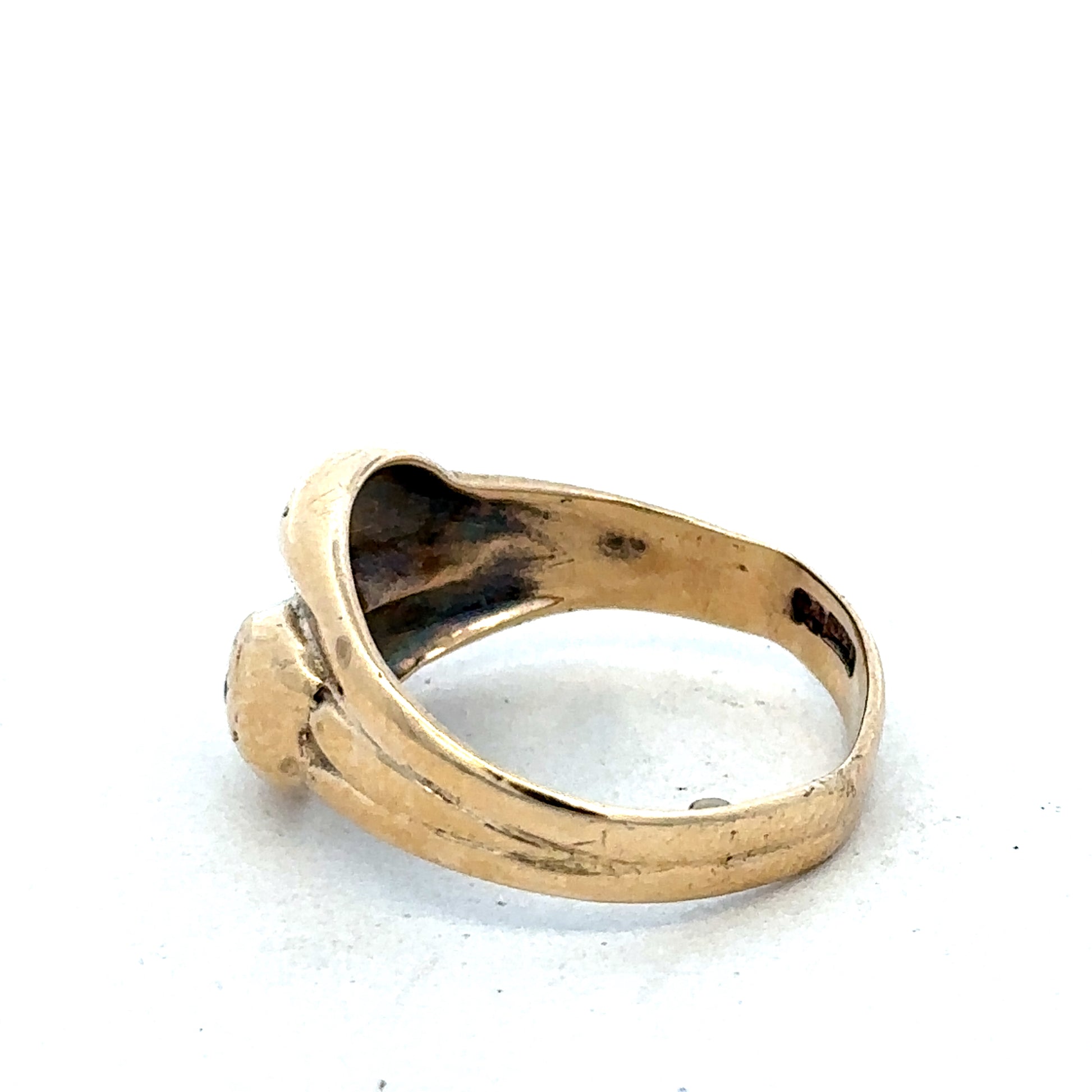 9ct yellow gold ring in size R by Reeves and Sons, showcasing a polished band with smooth finish.