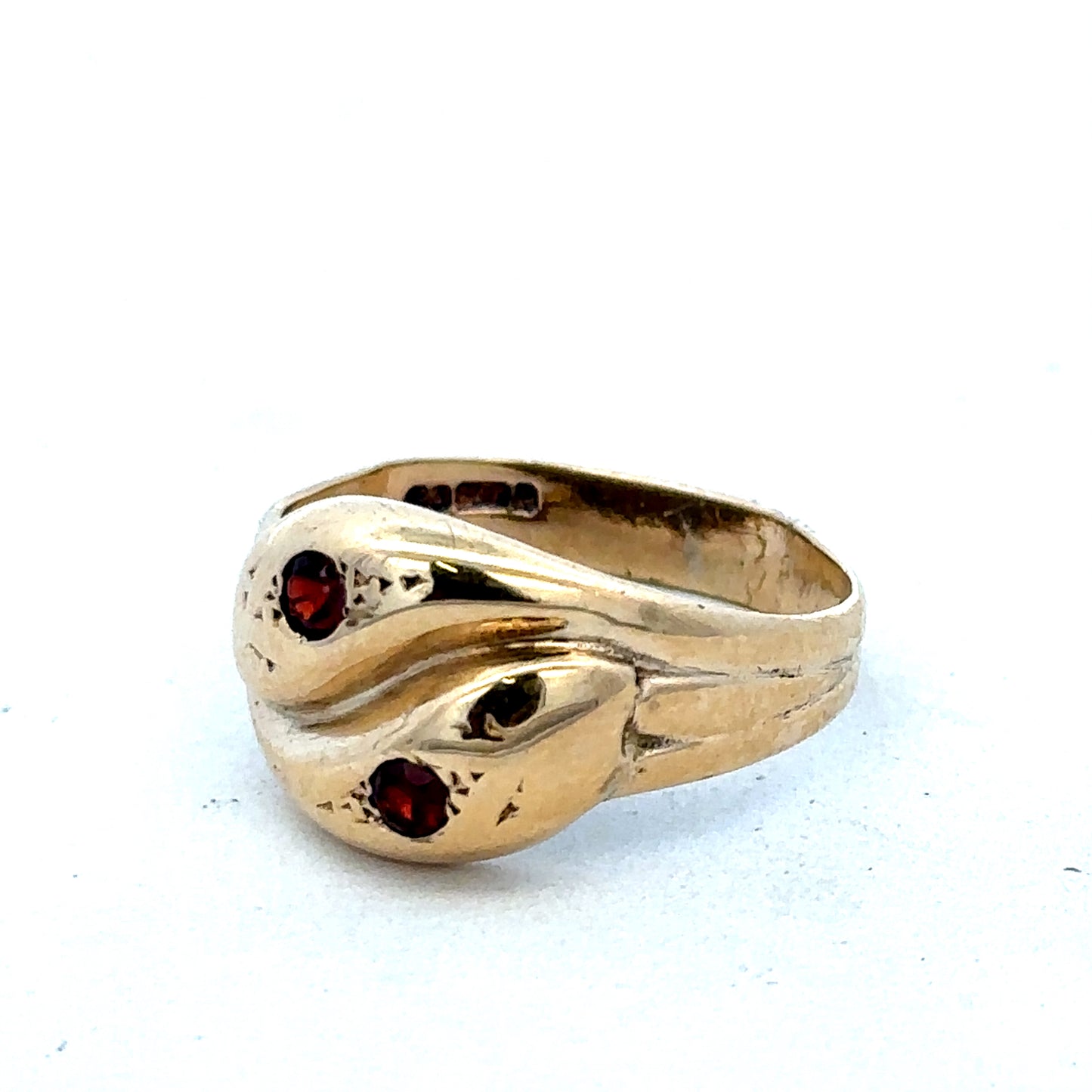 9ct yellow gold ring size R by Reeves and Sons, featuring a smooth polished band, shown from a front view.