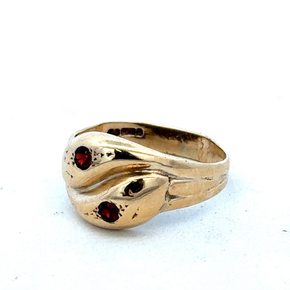 9ct yellow gold ring size R by Reeves and Sons, featuring a smooth polished band, shown from a front view.