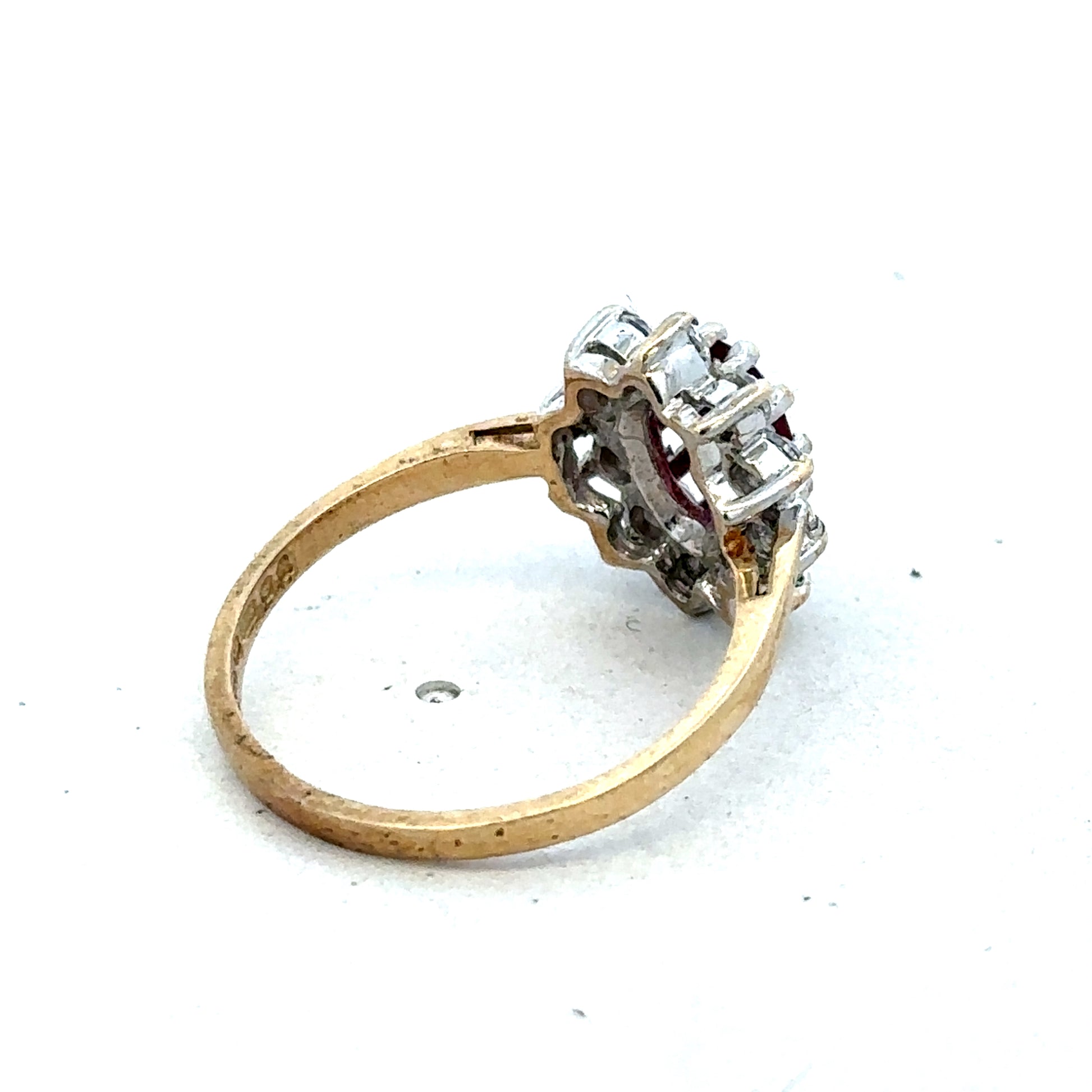 9ct yellow gold ring size N by Reeves and Sons, showcasing a polished gold band with a smooth finish.