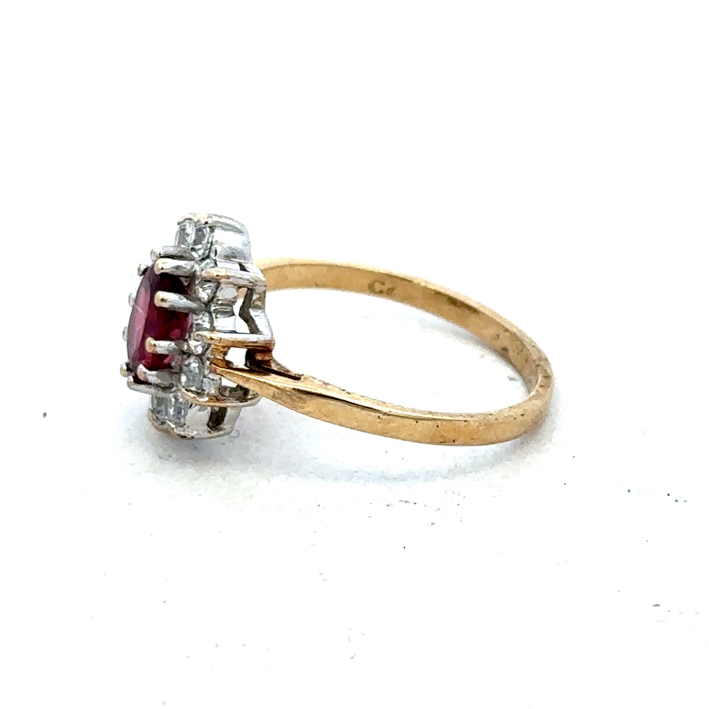 9ct yellow gold ring size N by Reeves and Sons, featuring a smooth polished band and classic design.