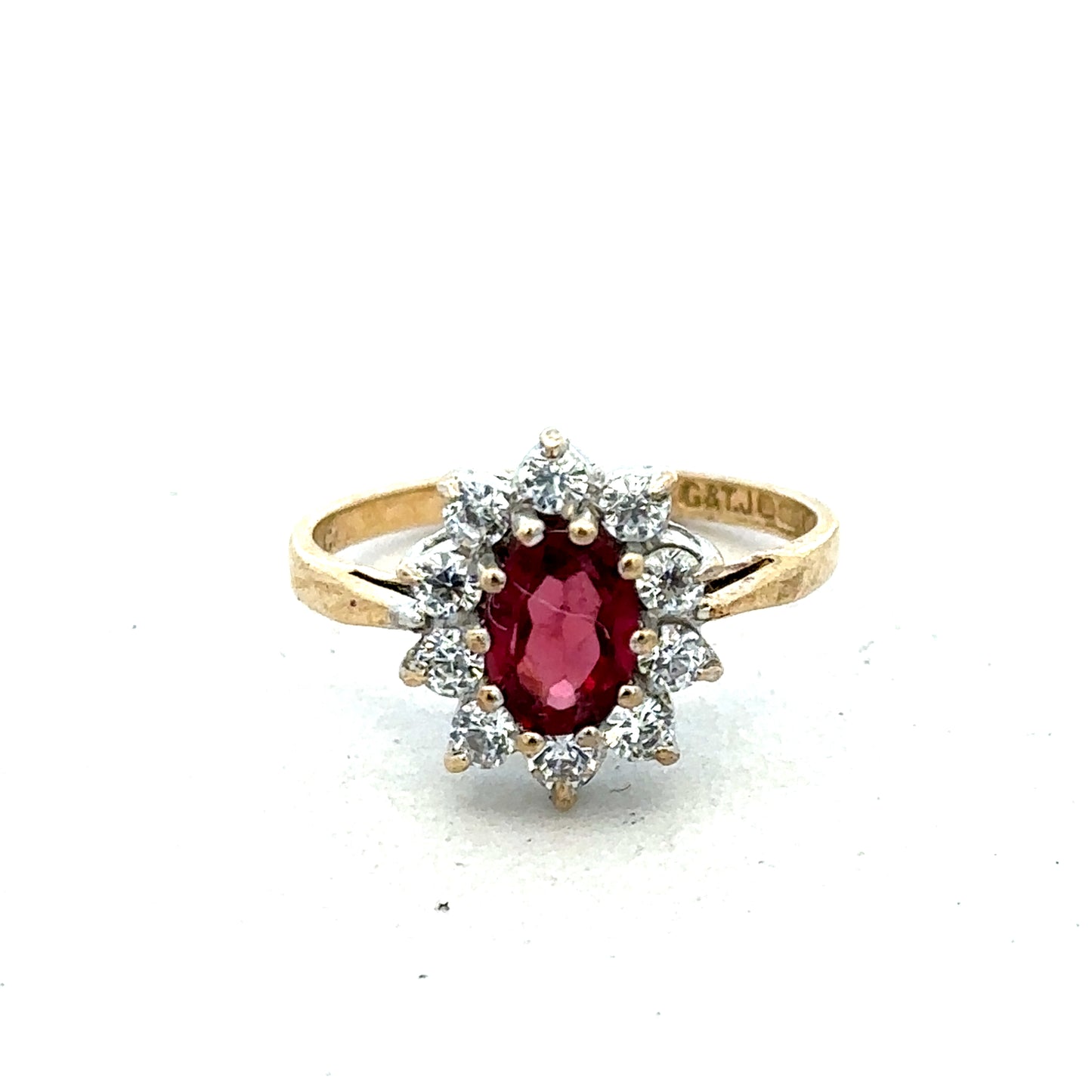 9ct yellow gold ring size N by Reeves and Sons, showcasing a smooth band with a polished finish.