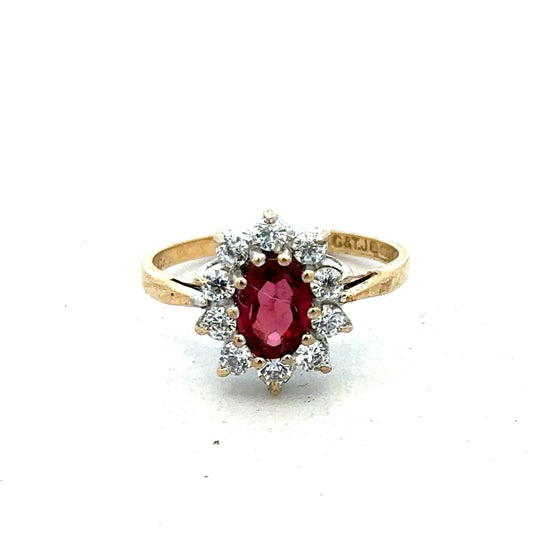 9ct yellow gold ring size N by Reeves and Sons, showcasing a smooth band with a polished finish.