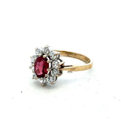 9ct yellow gold ring in size N with a smooth band, crafted by Reeves and Sons, shown close-up on a white background.