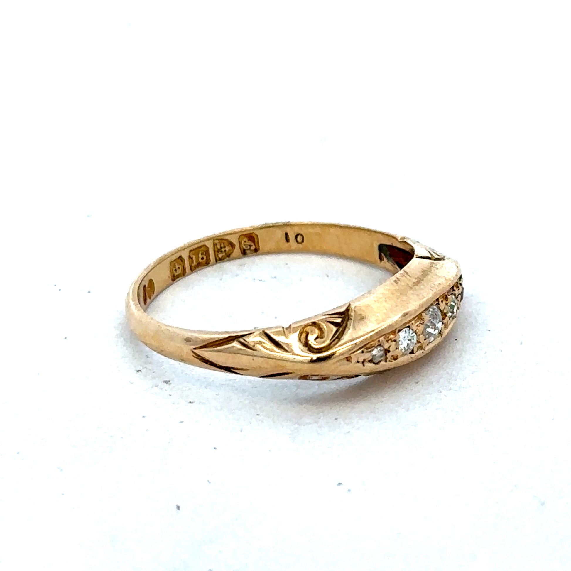 18ct yellow gold diamond ring size P by Reeves and Sons, featuring sparkling diamonds and elegant design.
