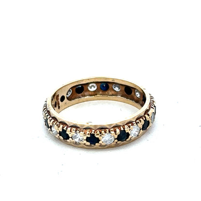 9ct yellow gold ring size M1/2 by Reeves and Sons, featuring a polished band and classic design.