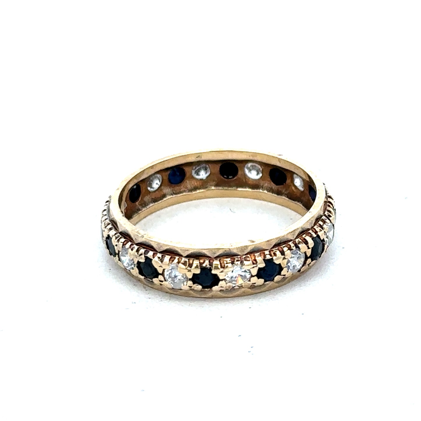 9ct yellow gold ring in size M1/2 featuring a smooth band, crafted by Reeves and Sons, shown in close-up detail.