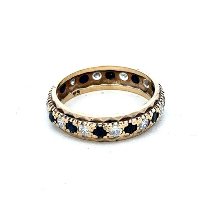 9ct yellow gold ring in size M1/2 with a smooth band, crafted by Reeves and Sons.