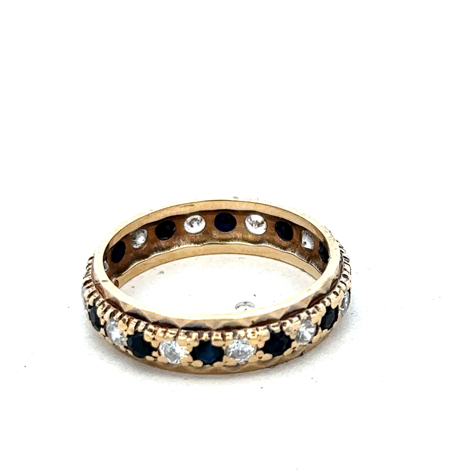9ct yellow gold ring in size M1/2 with a smooth polished finish, designed by Reeves and Sons.
