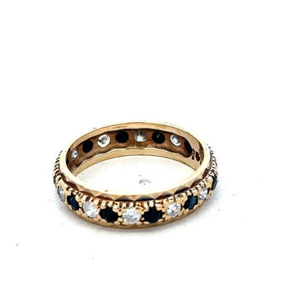 9ct yellow gold ring in size M1/2 from Reeves and Sons, featuring a smooth polished band and elegant design.