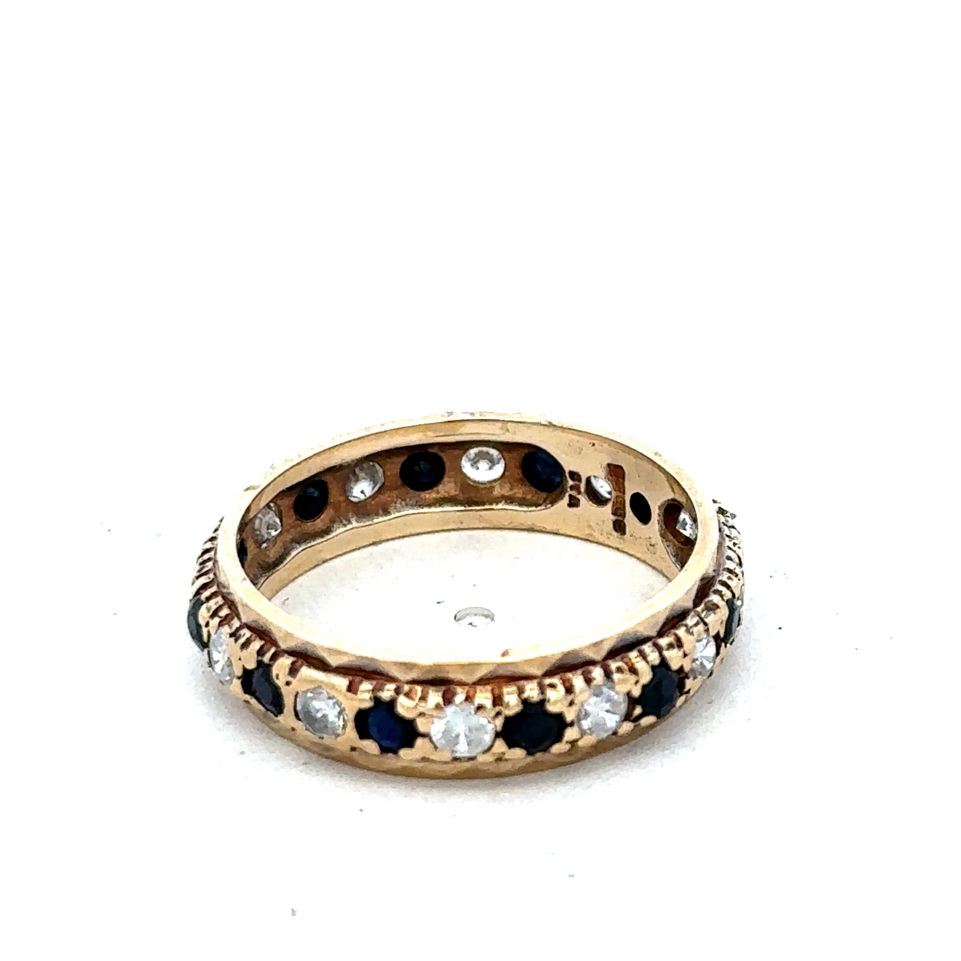 9ct yellow gold ring size M1/2 with a smooth band, crafted by Reeves and Sons, shown on a plain background.