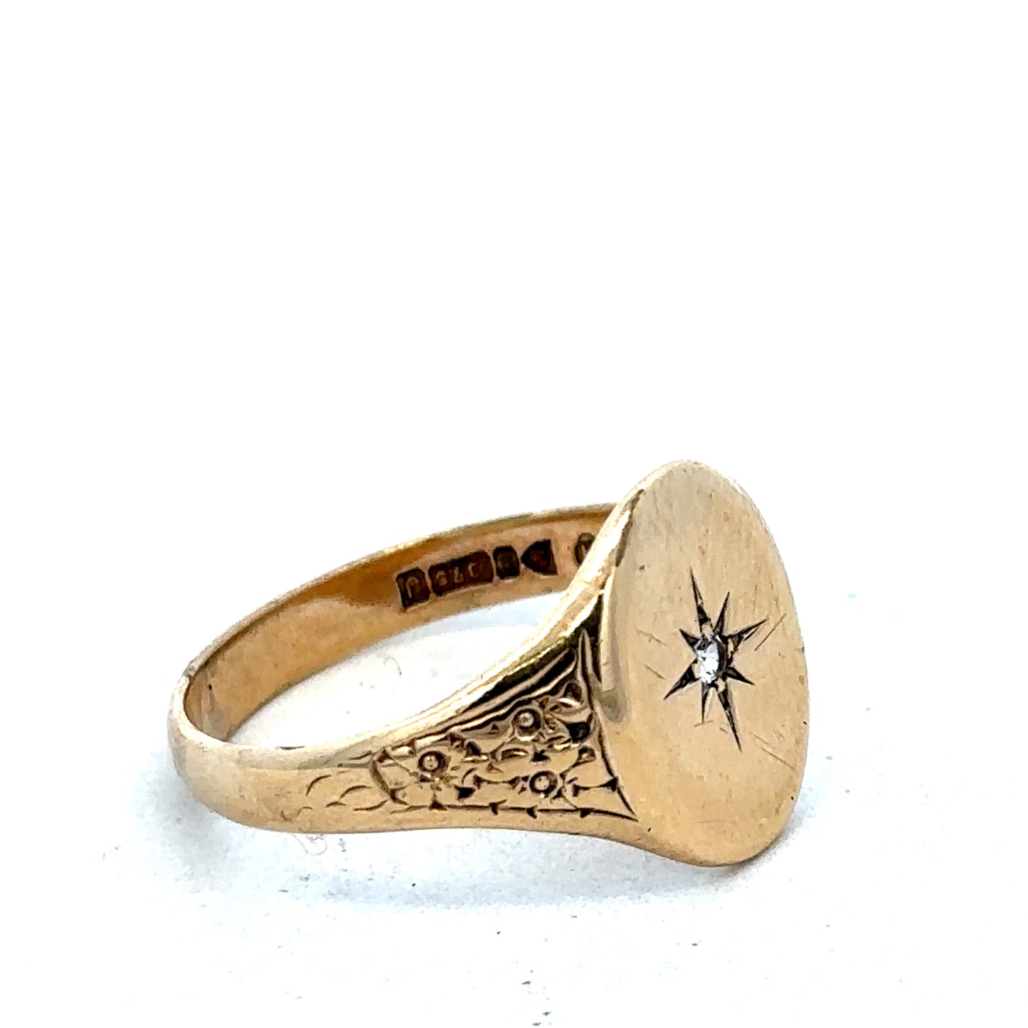 9ct yellow gold signet ring in size U, featuring a polished finish and classic design by Reeves and Sons.