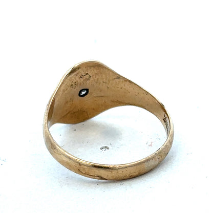 9ct yellow gold signet ring in size U with Reeves and Sons branding, featuring a polished smooth surface.