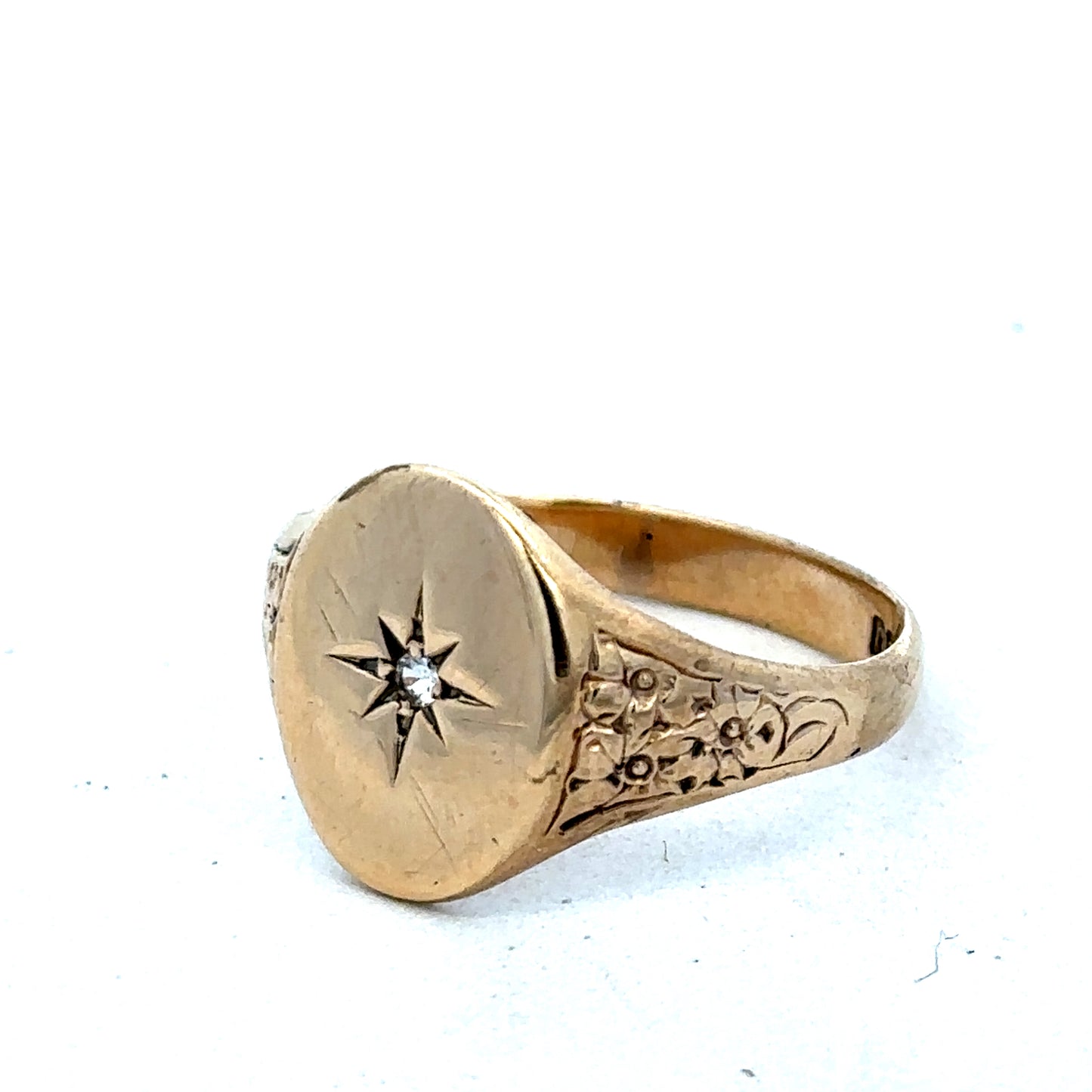 9ct yellow gold signet ring in size U with smooth polished surface, crafted by Reeves and Sons.