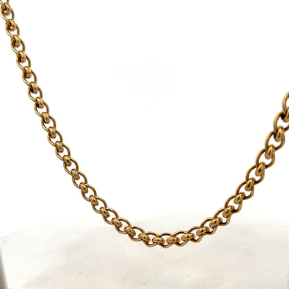 Reeves and Sons 9ct yellow gold rollerball chain, 33.9g, close-up showing detailed gold chain links.
