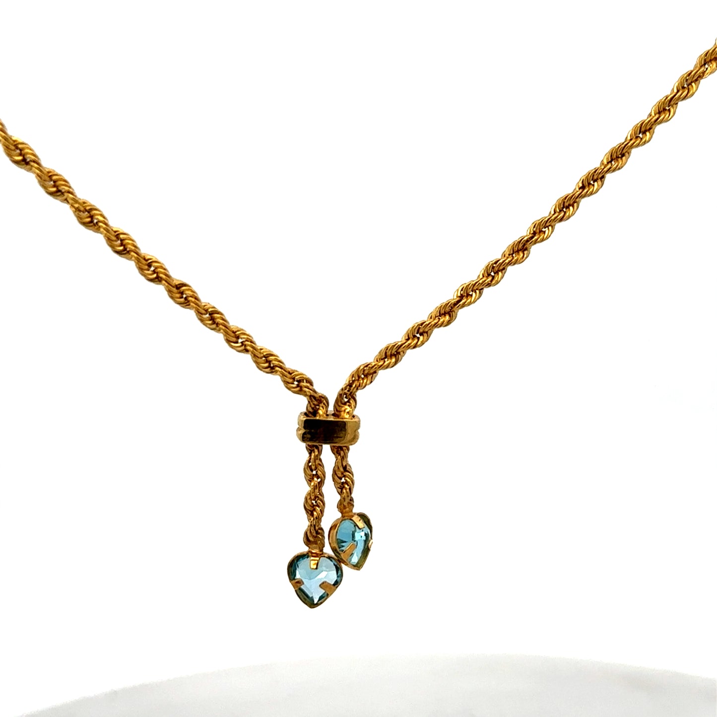 Reeves and Sons 9ct yellow gold chain weighing 3.8g, featuring a detailed link design, close-up view of the jewelry.
