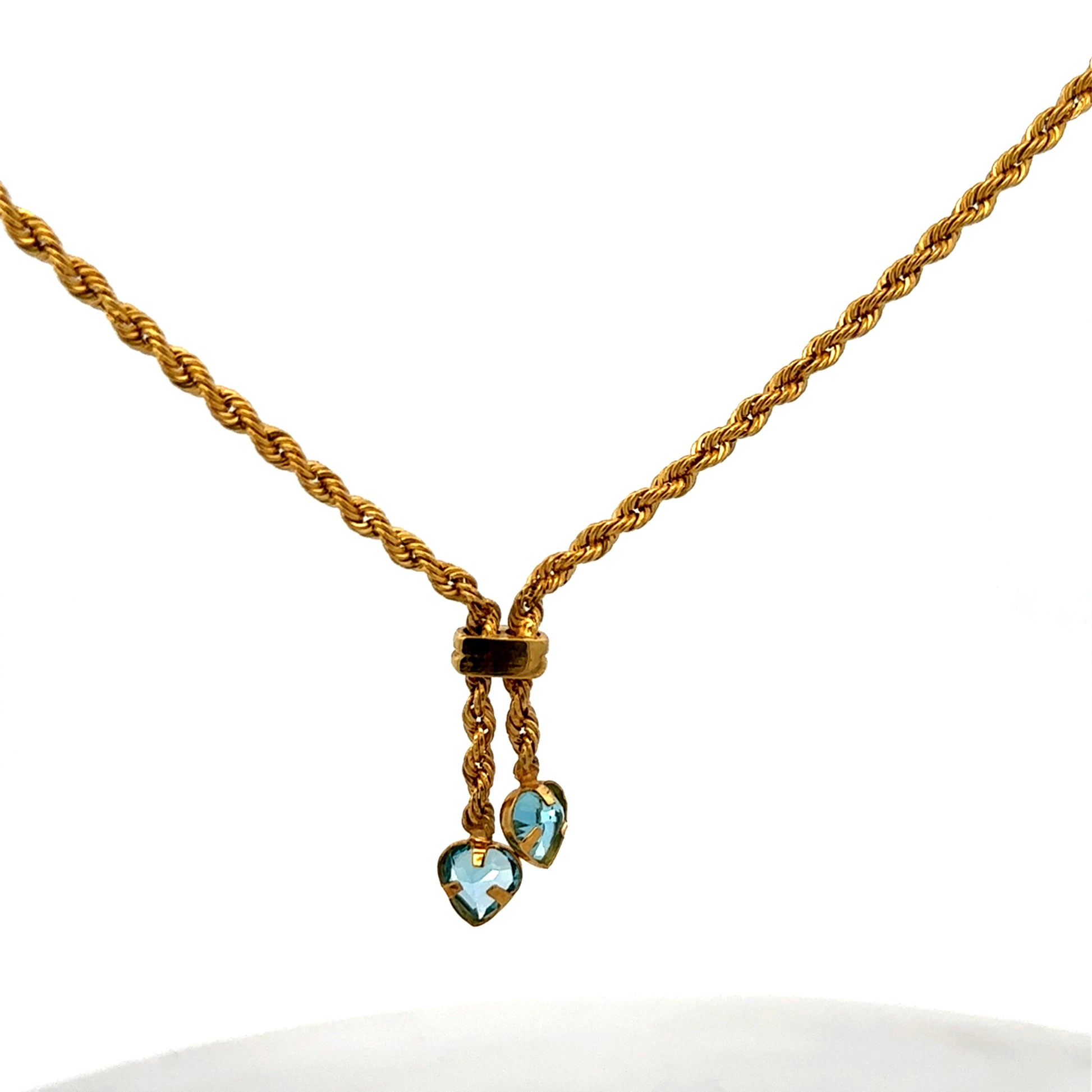Reeves and Sons 9ct yellow gold chain weighing 3.8g, featuring a detailed link design, close-up view of the jewelry.